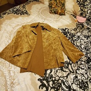 One tan body shirt with tan jacket.